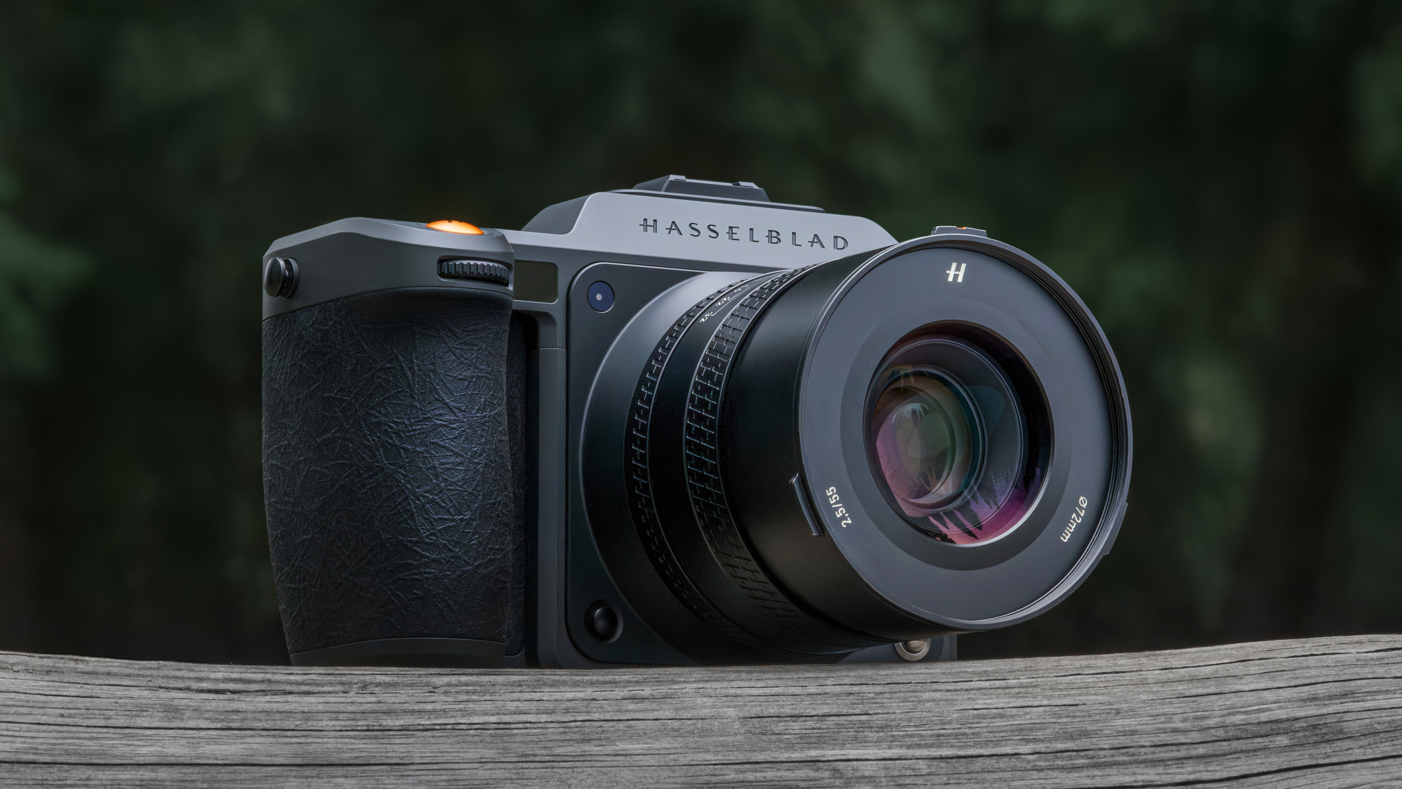 Hasselblad X2D II 100C on a wooden surface outdoors