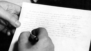 Einstein writing by hand