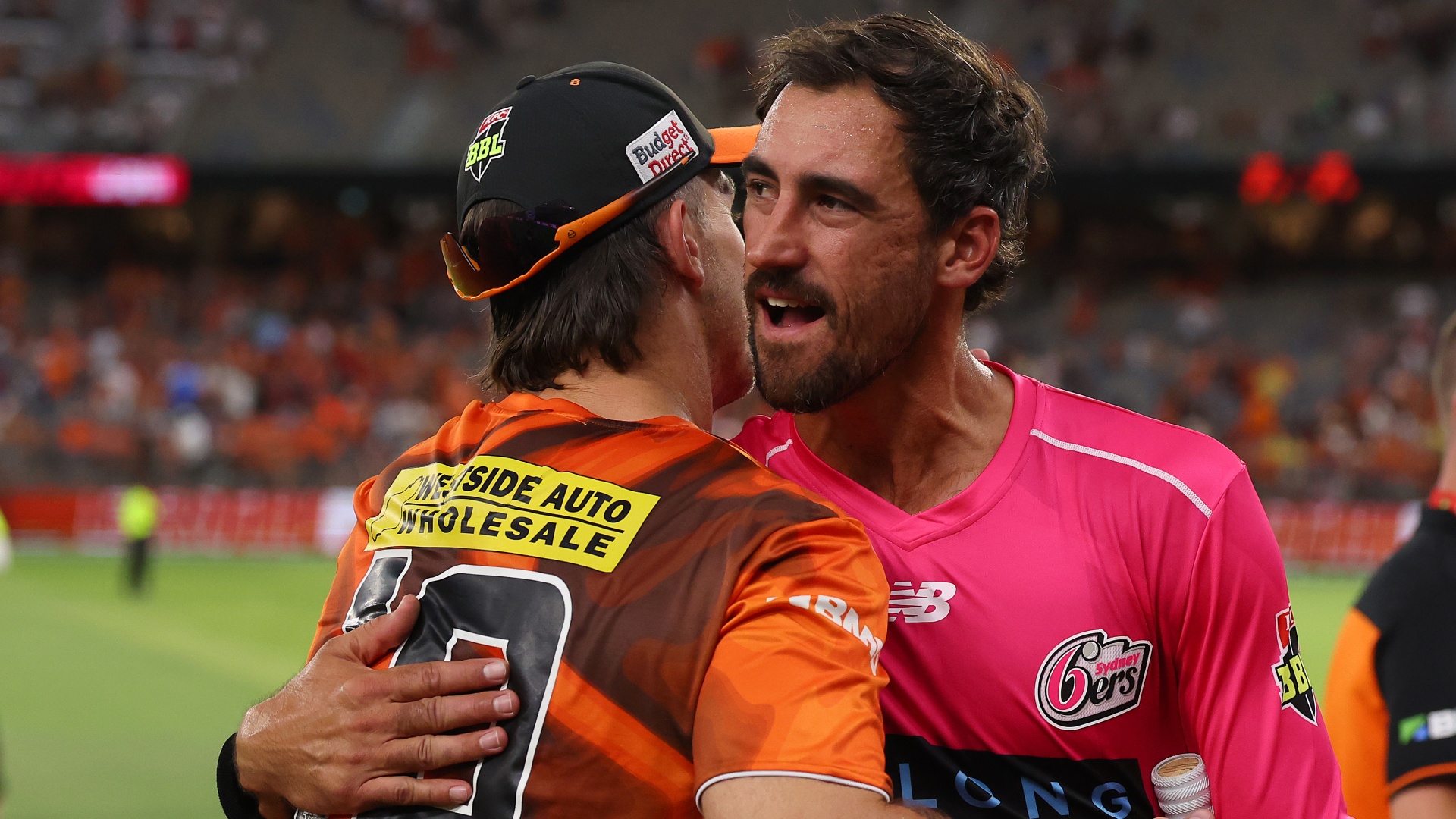 Mitchell Marsh of the Scorchers Mitchell Starc of the Sixers embrace ahead of the 2026 BBL Final