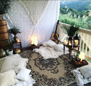 Boho outdoor balcony with rug and cushions