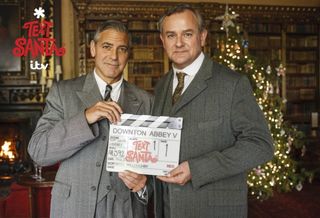George Clooney with Downton Abbey star Hugh Bonneville