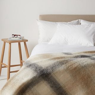 cosy check mohair throw on the bed
