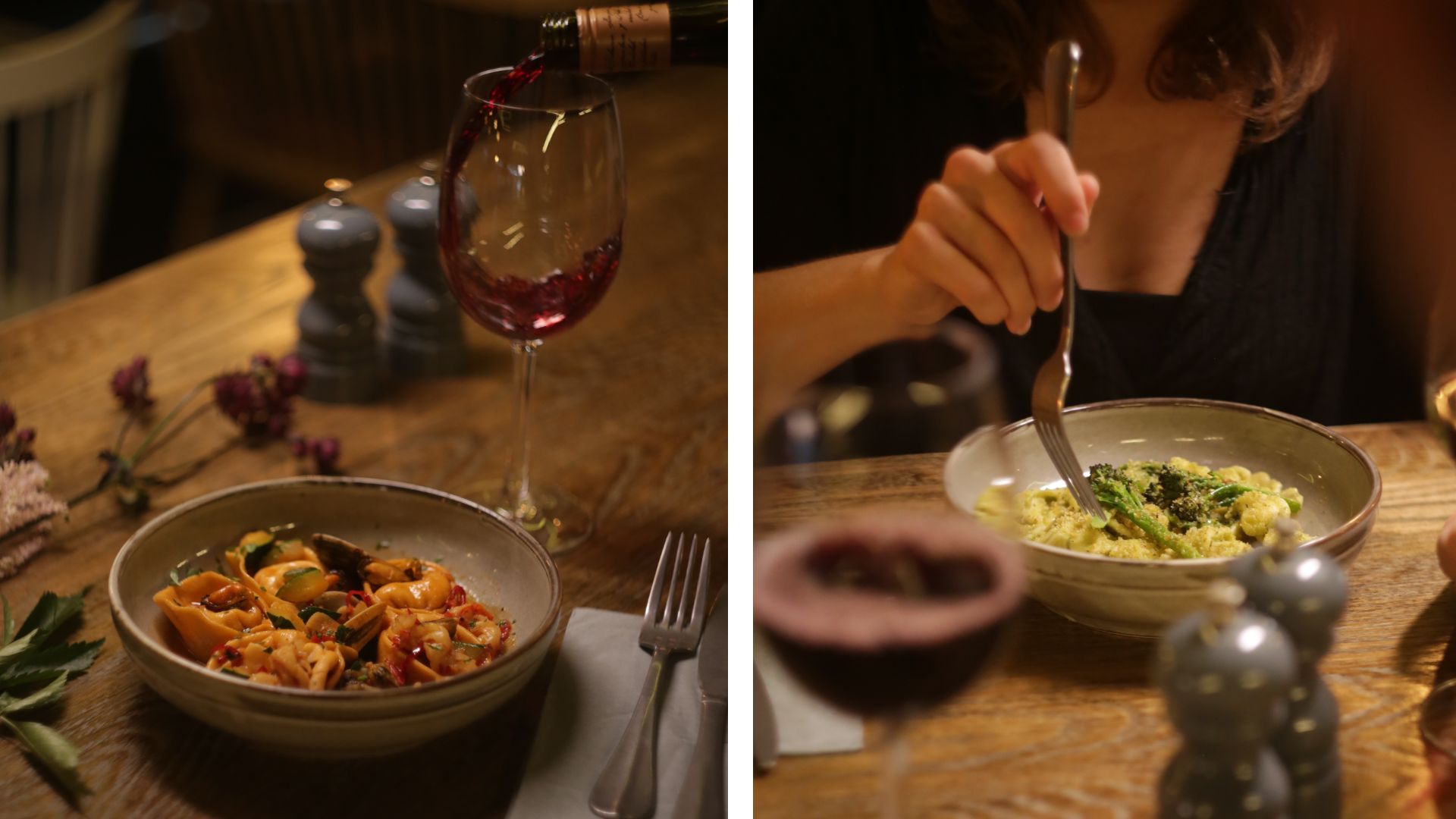 an image of two plates of pasta on a brown table, accompanied by glasses of red wine