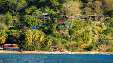 A view from the sea to the coastline and Castara's Resort