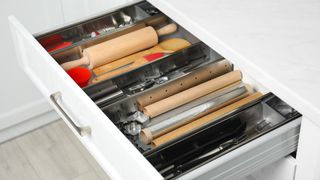 picture of utensil drawer with dividers in it