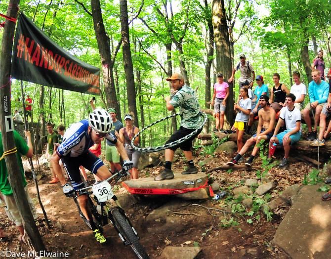 The crowds at the USA National Mountain Biking Championships in Pennsylvania were in a partying mood at the top of the course. Carl Decker (Giant Factory Team) snakes his way to the top.