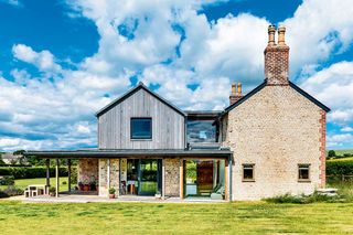 Contemporary two storey extension to cottage