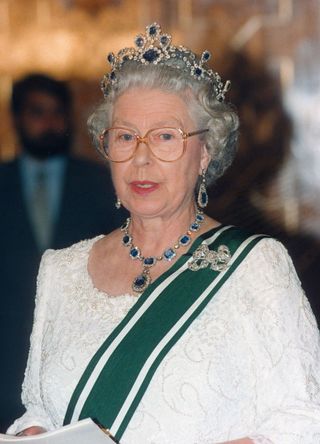Queen Elizabeth II attends a banquet in Islamabad