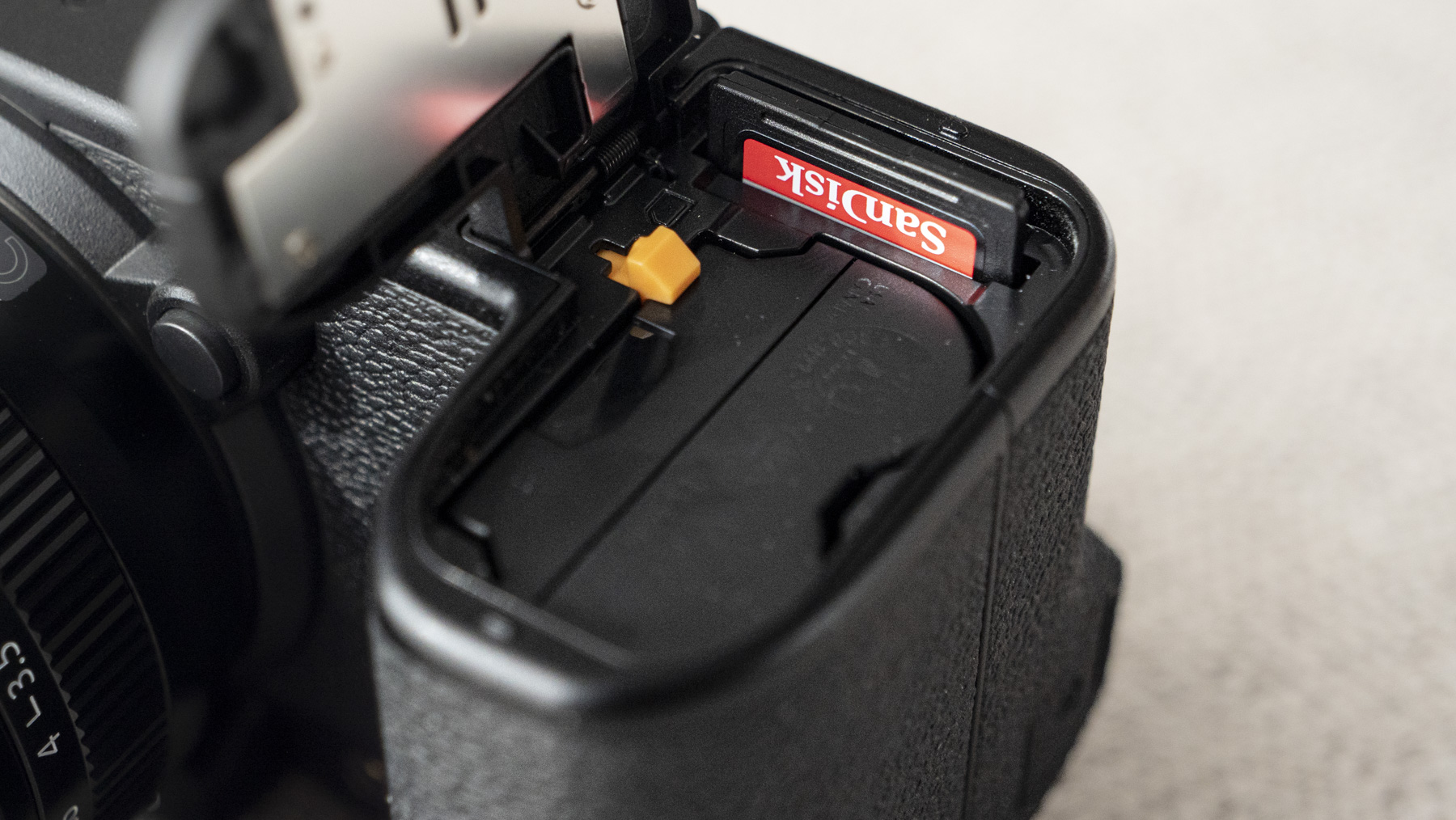 Fujifilm X-S20 camera closeup of battery and memory card door