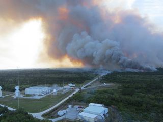 Additional NASA facilities that were protected during the second day of the Center fire were a radar site, a launch tracking camera and the laser range. The fire occurred just south of NASA’s Kennedy Space Center headquarters on Merritt Island in Audobon, Florida. This image was taken on April 2, 2013.