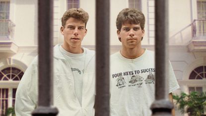 Lyle and Erik Menendez, standing behind a gate evoking jail bars, in the poster for &#039;The Menendez Brothers&#039; Netflix documentary.