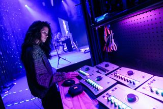 One of the worship team’s vocalists steps offstage to make a quick adjustment to her personal binaural mix on one of the church’s KLANG:kontrollers