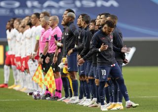 PSG’s Neymar, right, gestures as the teams line-up before the Champions League semifinal soccer match between RB Leipzig and Paris Saint-Germain at the Luz stadium in Lisbon, Portugal