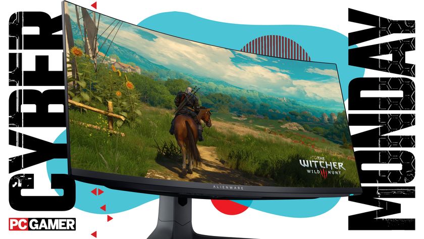 An Alienware gaming monitor on a blue Cyber Monday background.