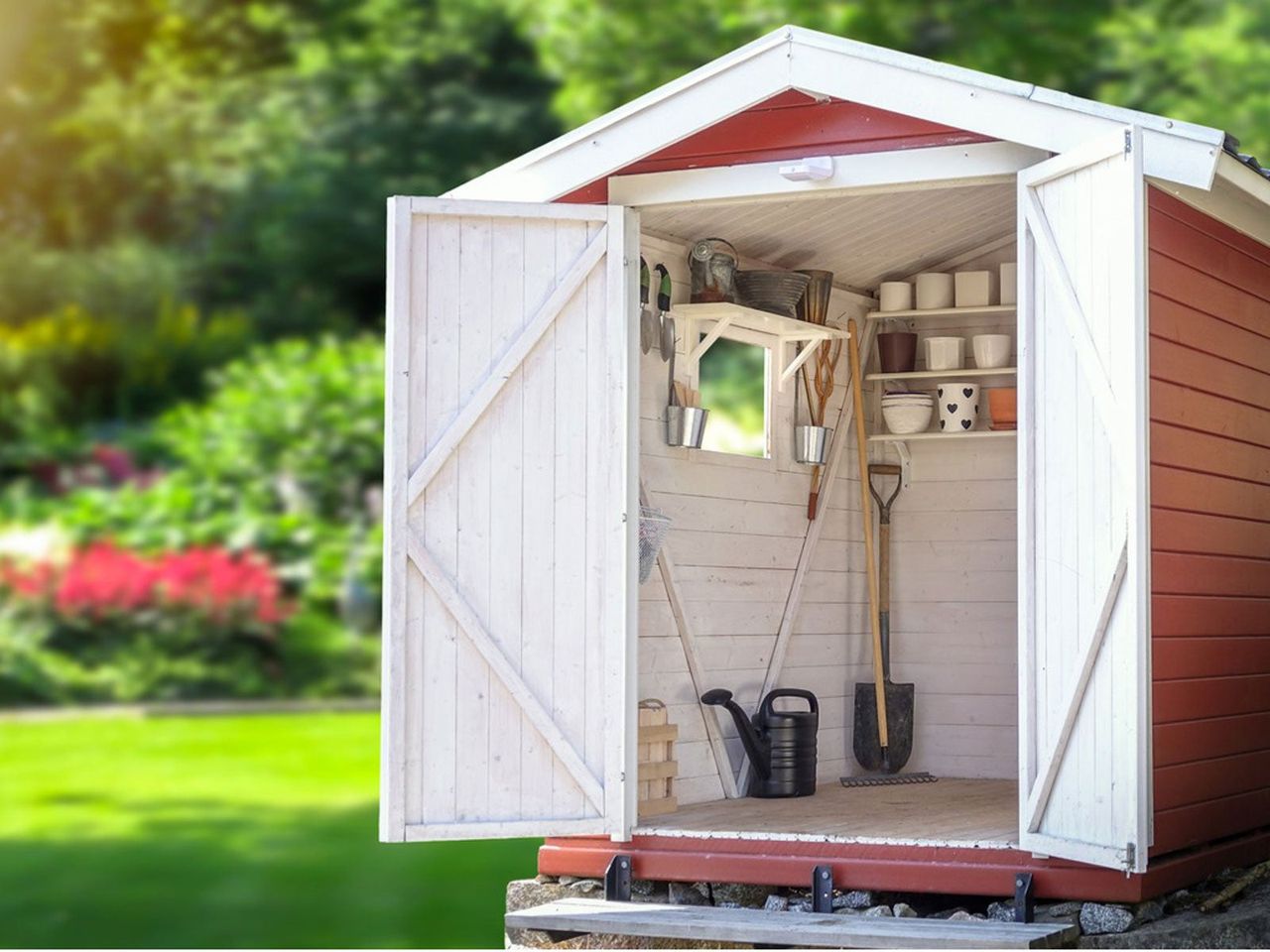 Storage Shed Full Of Gardening Tools In The Backyard