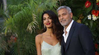 amal and george clooney in their garden