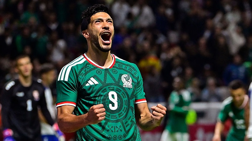 Raul Jimenez of Mexico celebrates after scoring his team's third goal during the international friendly match between Mexico and Serbia. 