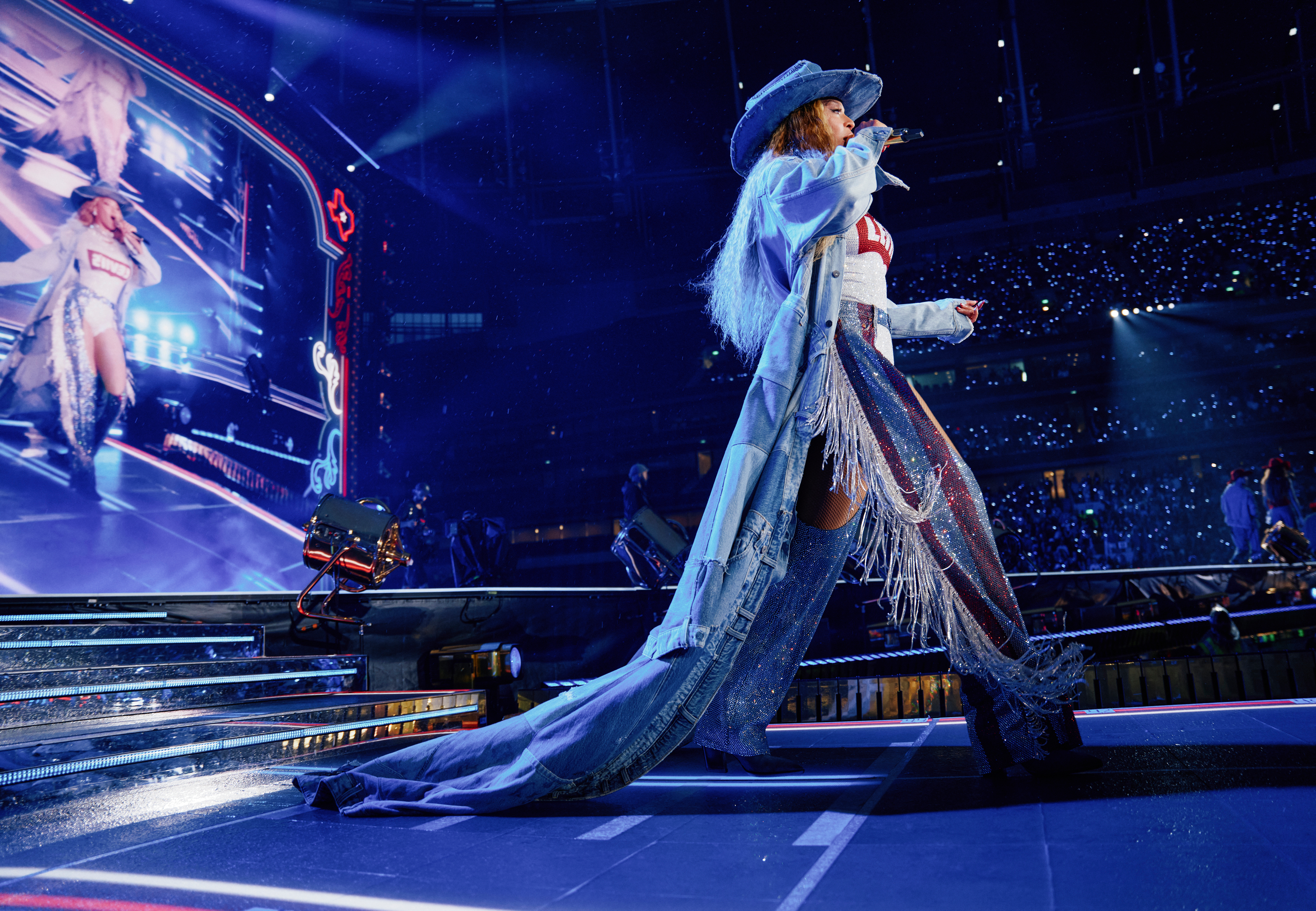 Beyoncé takes center stage at the 'Cowboy Carter' concert in a custom denim Levi's look.