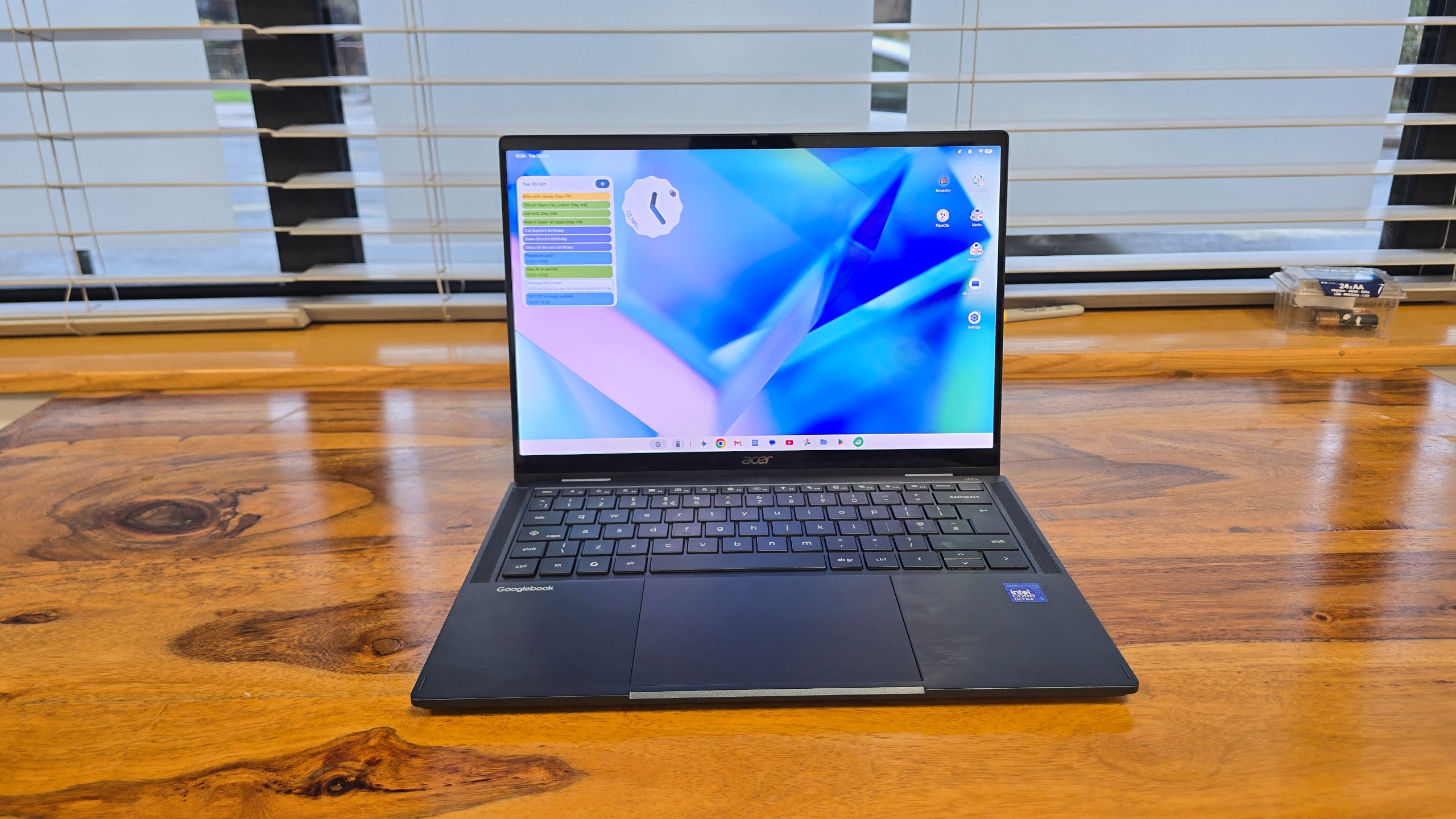 Acer Googlebook 14 on a wooden desk in an office