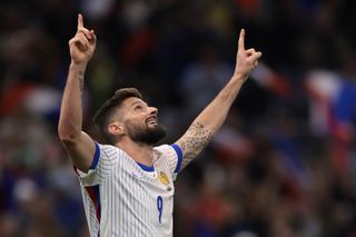 Olivier Giroud celebrates after scoring for France against Chile in March 2024.
