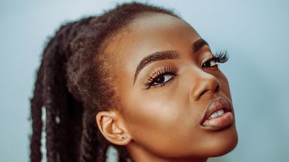 Close-up of a woman with contour and lashes