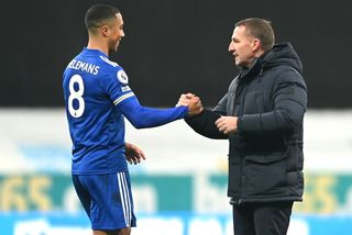 Youri Tielemans is congratulated by Brendan Rodgers