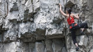 rock climbing terms: climber on crag