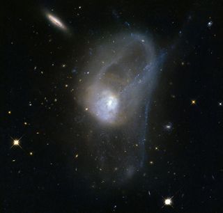 Interacting Galaxies NGC 3921