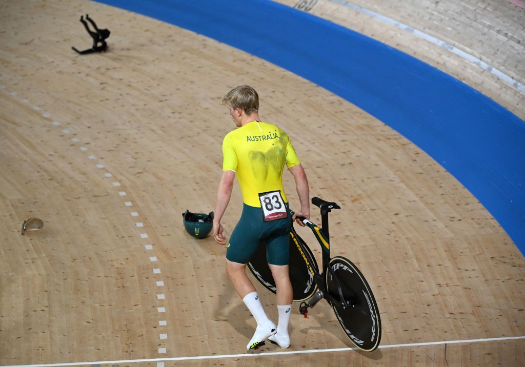 Alex Porter of Australia gathers his Team Pursuit bike after his crash