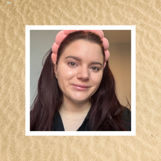 brooke knappenberger no makeup selfie with white border overlaid sand background