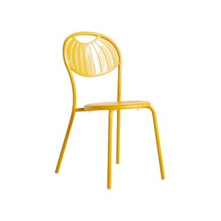 A yellow patio dining chair