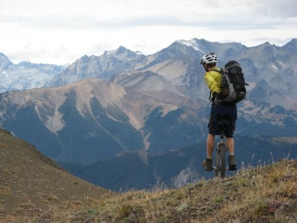 Unicyclist Kris Holm in the mountains