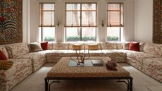 Dedar-upholstered sectional sofa and coffee table pictured in the living room of an Upper East Side townhouse