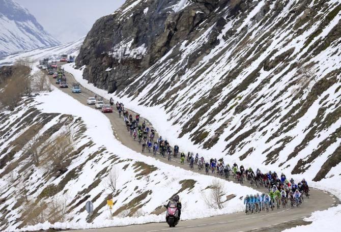 Astana control the peloton during the early stages from Valloire to Ivrea