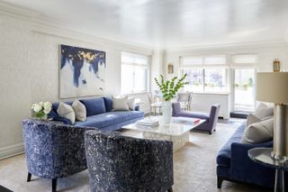 Modern blue living with shimmer wallpaper