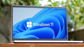 Windows 11 logo on a laptop screen