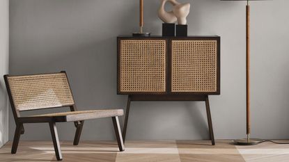 H&M Home Low lounge chair in home beside rattan storage
