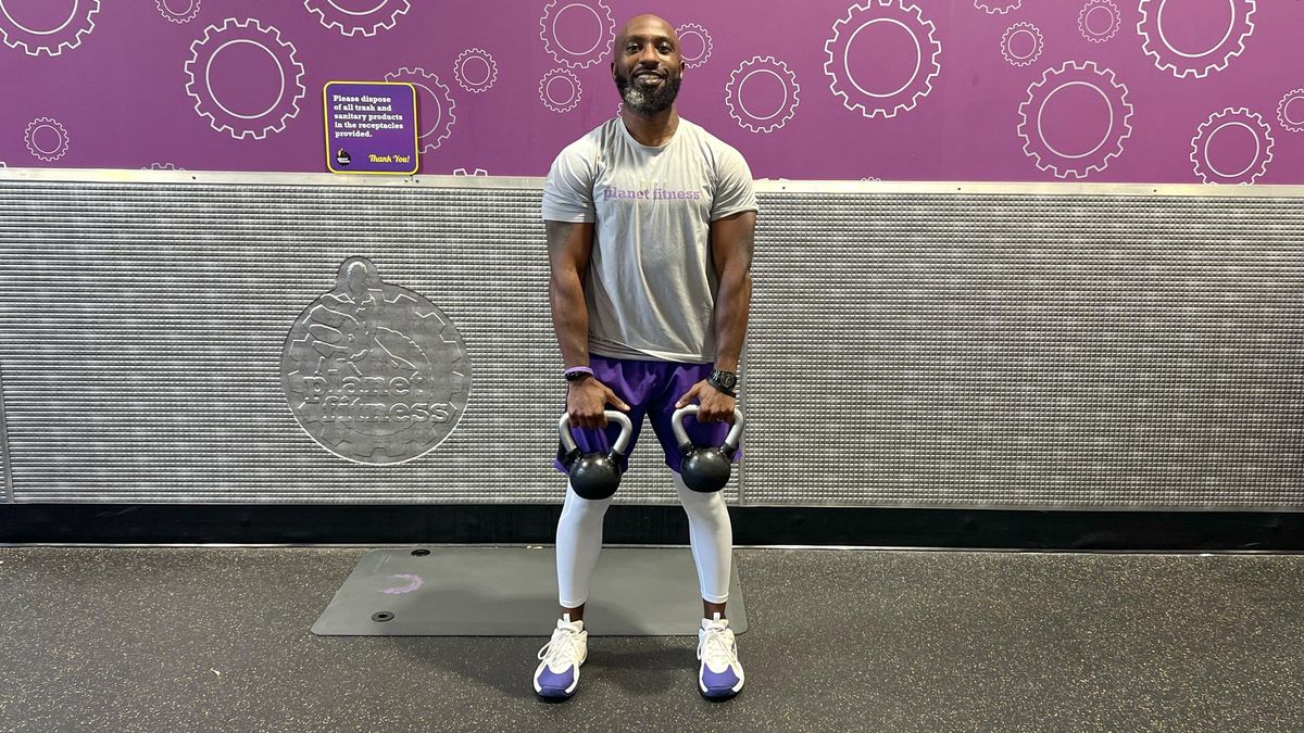 Teddy Savage starting a Romanian deadlift to upright row