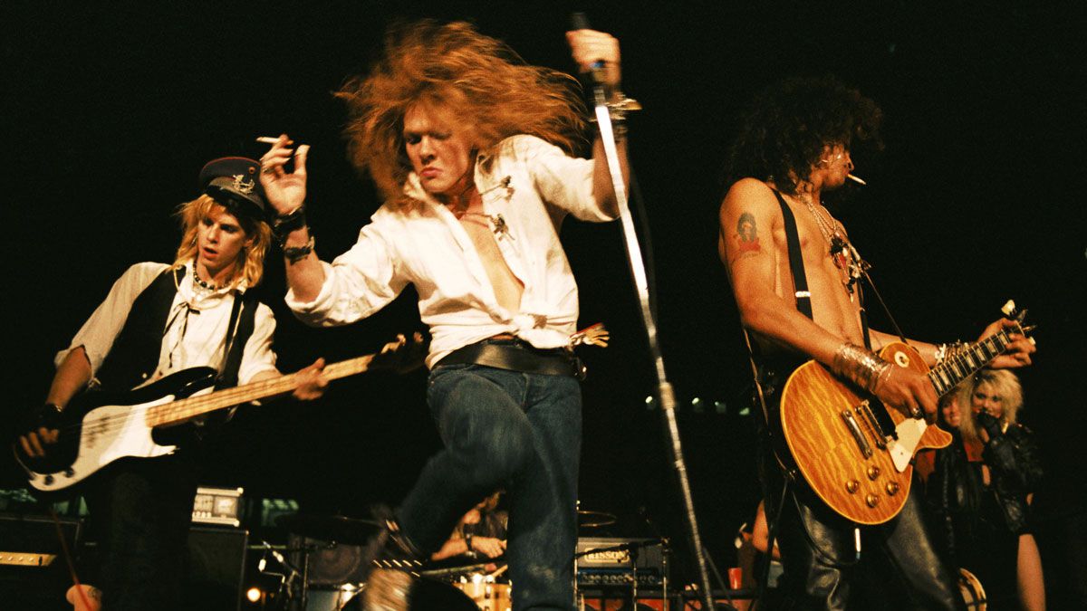 Duff McKagan, Axl Rose and Slash of the rock group &#039;Guns n&#039; Roses&#039; perform at the LA Street Scene on September 28, 1985 in Los Angeles, California. Slash uses a Gibson Les Paul electric guitar for the first time onstage with the band.