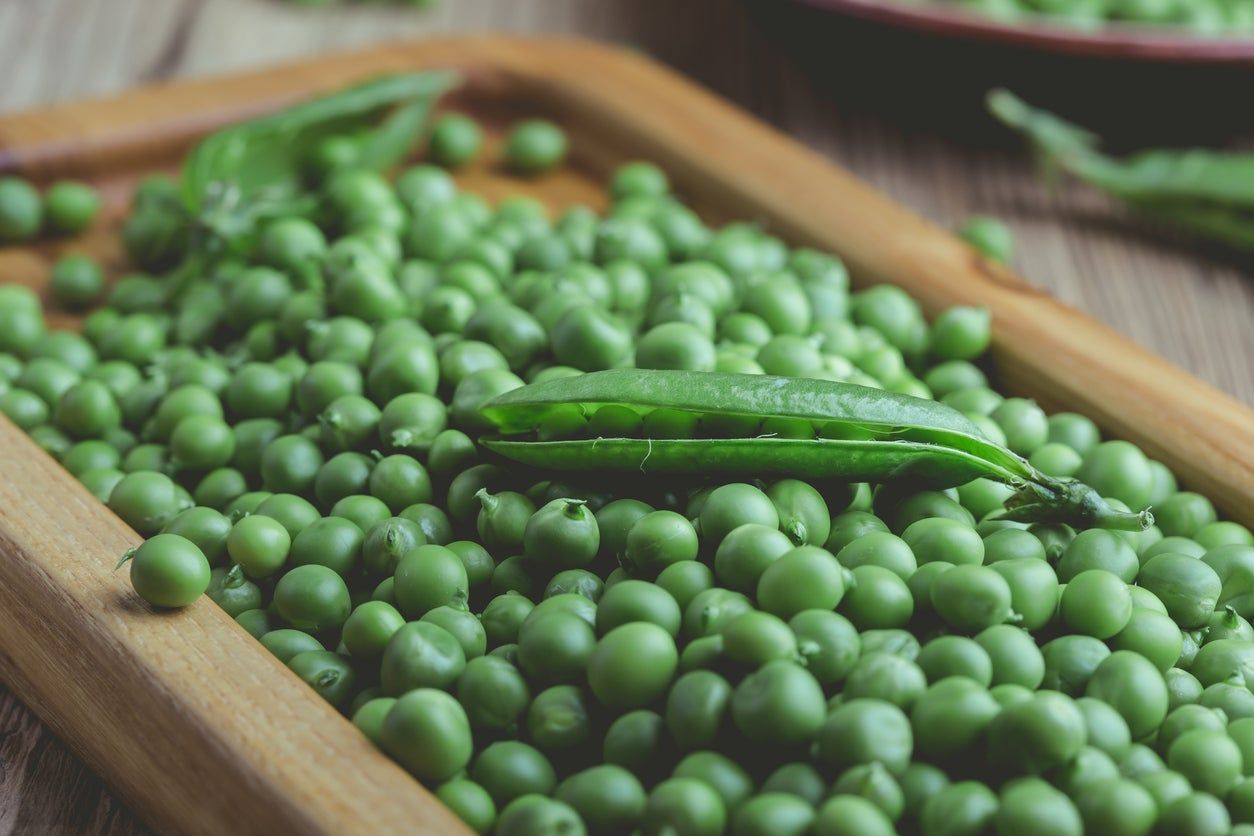 Wooden Board Full Of Peas