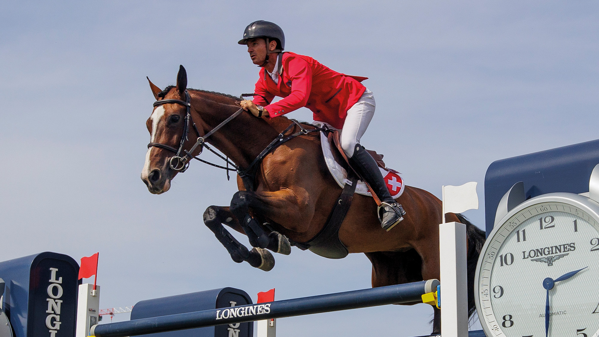 Close up of Steve Guerdat jumping Dynamix De Belheme