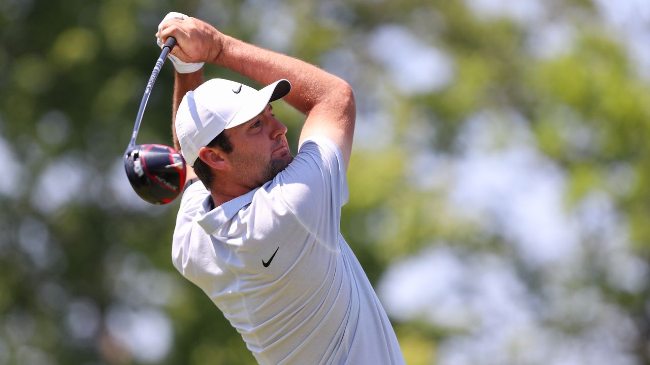 Scottie Scheffler watches his tee shot on the 18th hole during the Memorial Tournament.