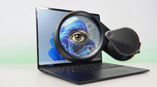 A Surface Laptop 8 displays a digital face blending with circuit patterns, under a magnifying glass highlighting an eye, symbolizing technology and digital surveillance.