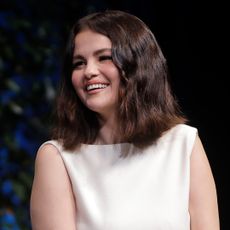 Selena Gomez was spotted in L.A. wearing a white sundress from Dôen and nude Mary Janes