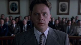 Tim Robbins stands in court with an expression of shock in The Shawshank Redemption.