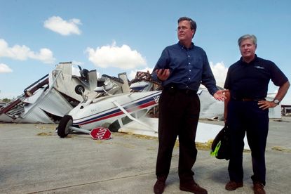 Jeb Bush at a Florida airport damaged by Hurricane Charley in 2004