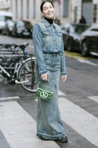 woman in denim maxi skirt and jean jacket