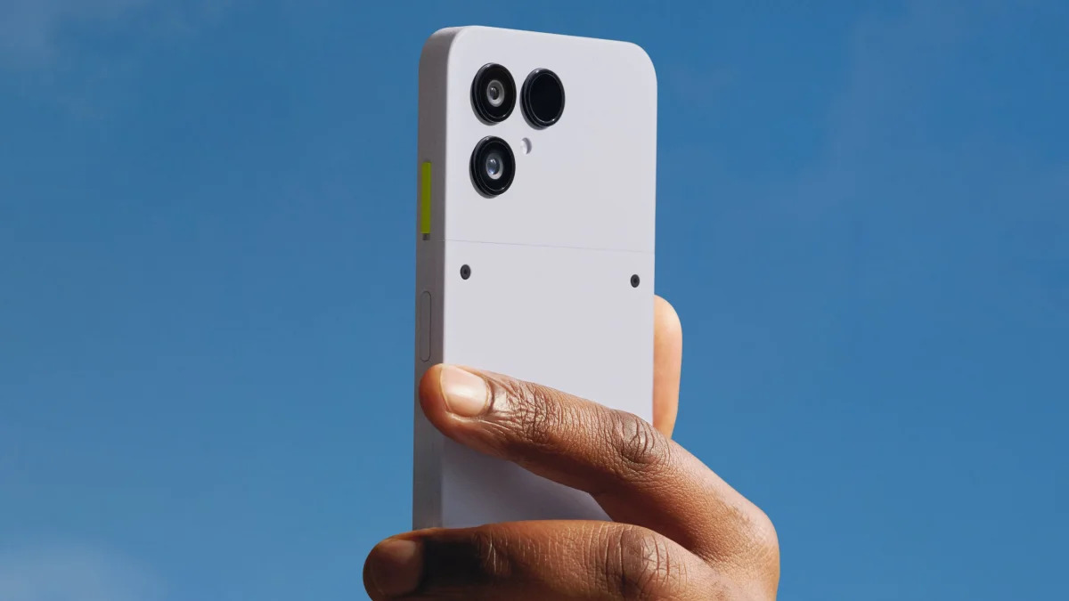 The Fairphone 6 being held in the hand