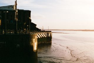 View over the River Mersey in Liverpool at sunset taken on Harman Phoenix 200 35mm film