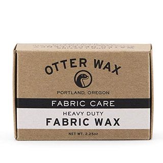 A cardboard box of Otter Wax Fabric Wax Bar